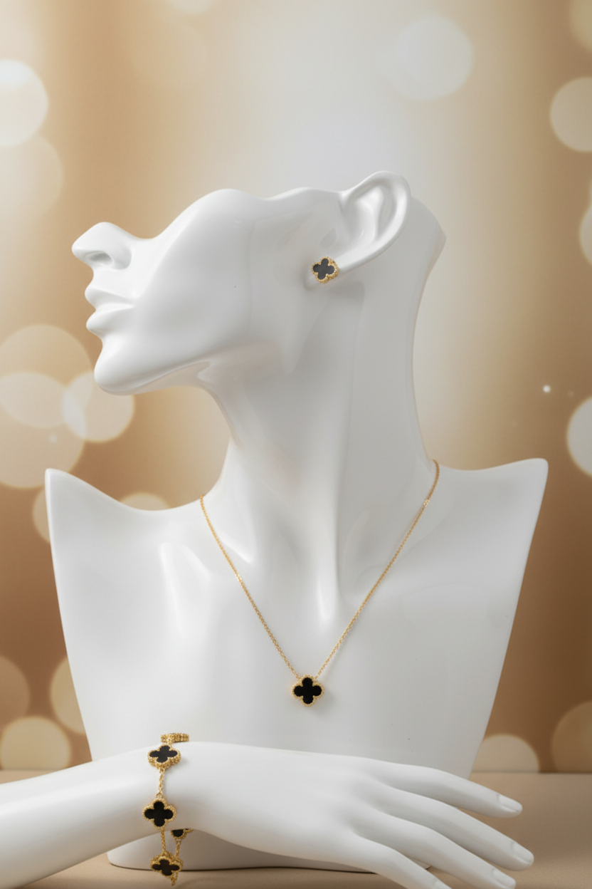 Collier, bracelet et boucles trèfle noir